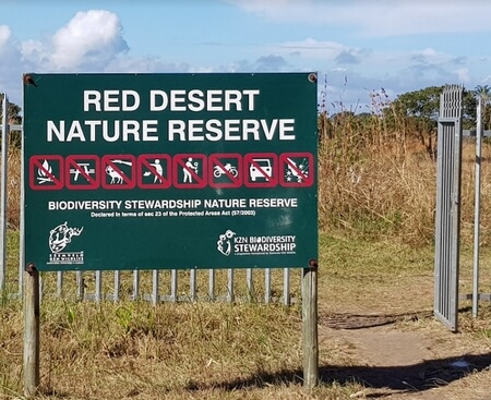The sign at the entrance of the Red Desert Nature Reserve